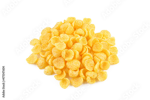 Pile of crispy corn puffs. Small salty flakes isolated on white background