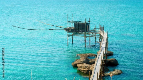 Trabocco of Punta Aderci at sunset, Vasto, Abruzzo. Trabucco a sort of Trebuchet, traditional wooden fishing house in southern Italy, on Costa dei Trabocchi (Coast Of the Trabocchi). RAW