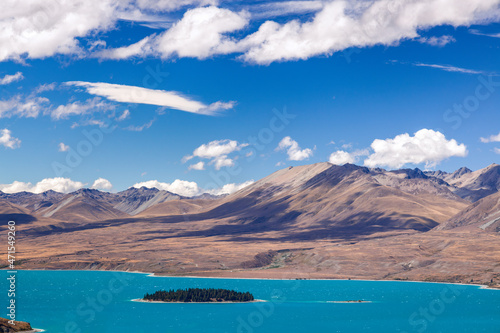 Scenic view of Motuariki Island in the colourful Lake Tekapo photo