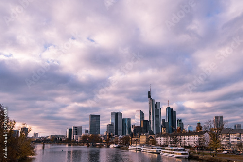 city skyline at dusk with clouds. An European city in the afternoon. the view of downtown with river © PHAT