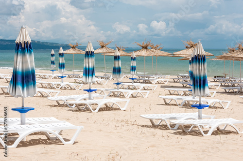 lounge chairs on the beach