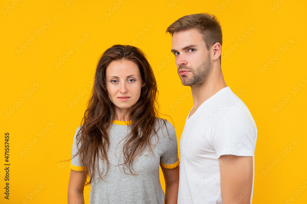 Fototapeta premium relationship of girl and guy on yellow background, love