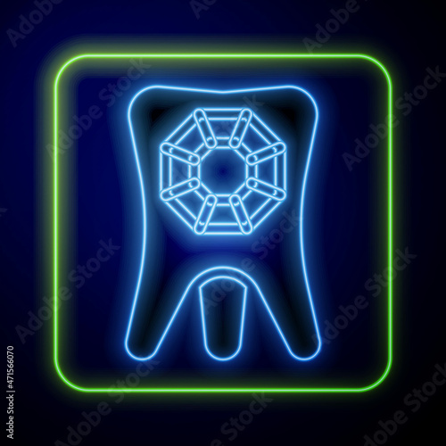 Glowing neon Tooth with diamond icon isolated on blue background. Vector