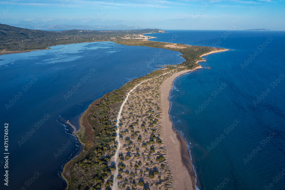 Aerial drone view of Halikounas Beach separated Lake Korission and Ionian Sea on Corfu Island, Greece