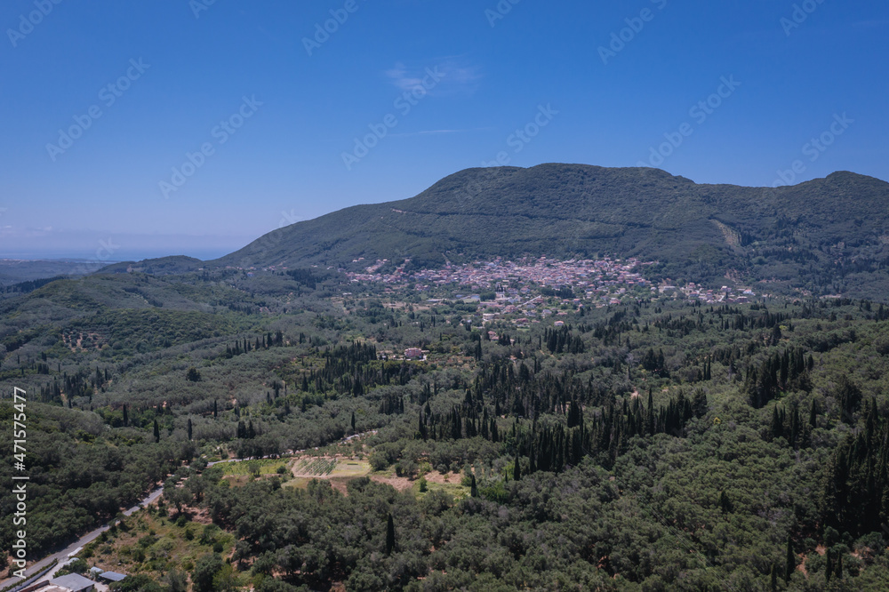 Drone photo od surroundings of Vouniatades mountainous village on the Corfu Island, Greece, Agios Matheos village on background