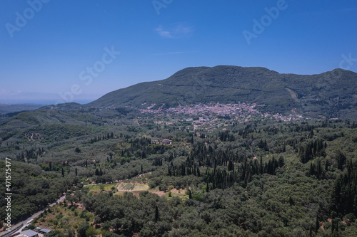 Drone photo od surroundings of Vouniatades mountainous village on the Corfu Island, Greece, Agios Matheos village on background