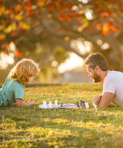 happy family. parenthood and childhood. checkmate. spending time together.