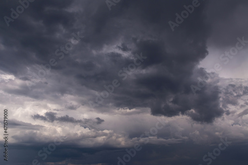 Epic Storm sky, dark grey clouds background texture