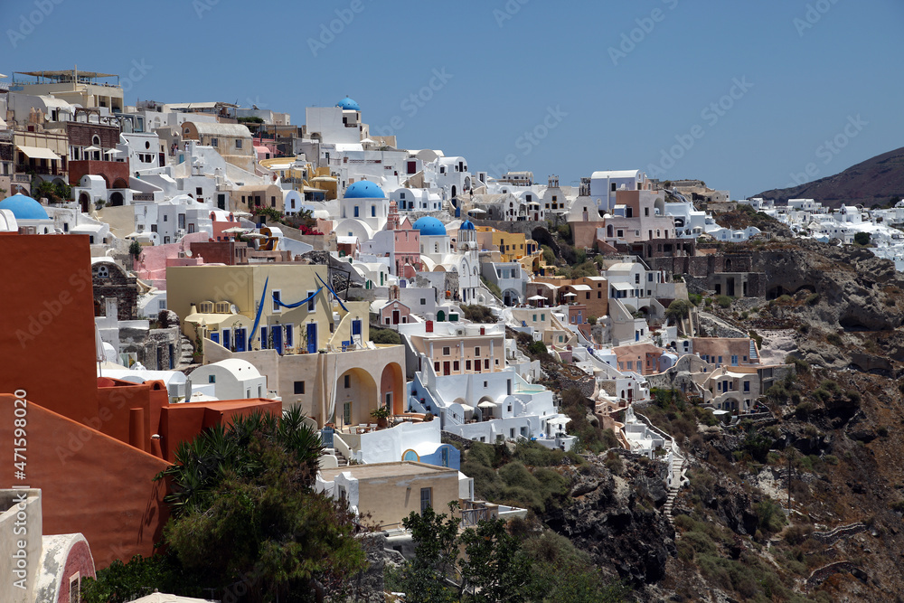 Oia Town at beautiful Greek island Santorini in Greece. Oia is a small town and former community in the South Aegean on the Santorini.