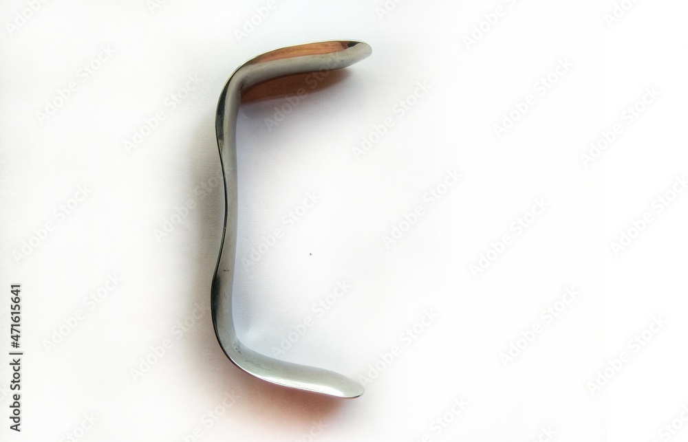 Sims` vaginal speculum is a double-bladed surgical instrument used for examining the vagina and cervix. Gynecologic speculum on a white background.medical, surgical instruments. 