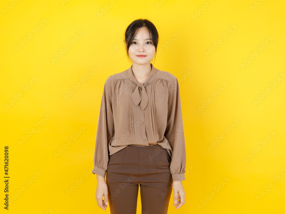 Pretty and healthy Asian woman smile and friendly laugh with innocent, charming face as happy and enjoy posing attractive costume fashion for beautiful blouse Pretty and healthy Asian woman smile and friendly laugh with innocent, charming face as happy and enjoy posing attractive costume fashion for beautiful blouse