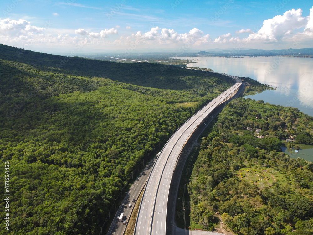 Obraz premium Drone aerial photographs of roads, highways in mountains and reservoirs.