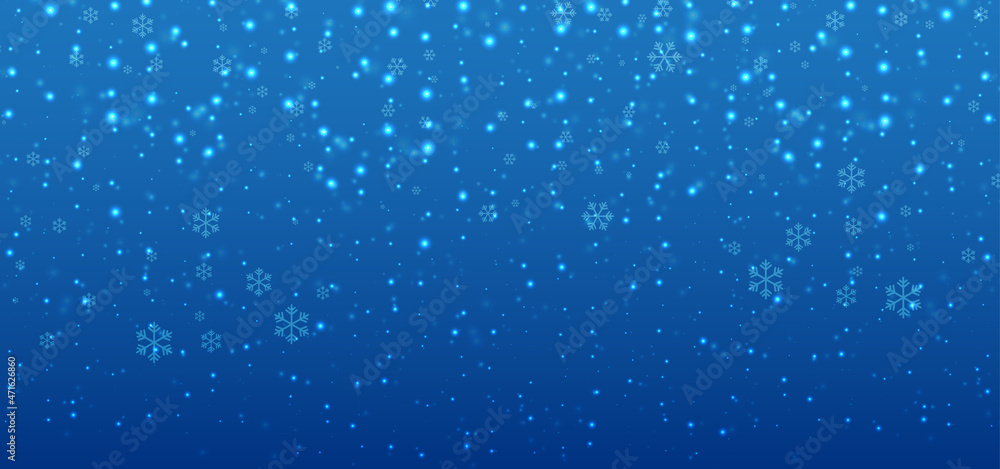 Christmas background with blue light and snowflakes