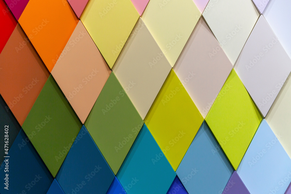 Surface of multi-colored rhombuses. Construction, renovation and interior design. Background. Surface of multi-colored rhombuses. Construction, renovation and interior design. Background.