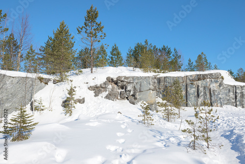 Sunny March day in a old Italian marble quarry. Mountain Park "Ruskeala". Karelia, Russia