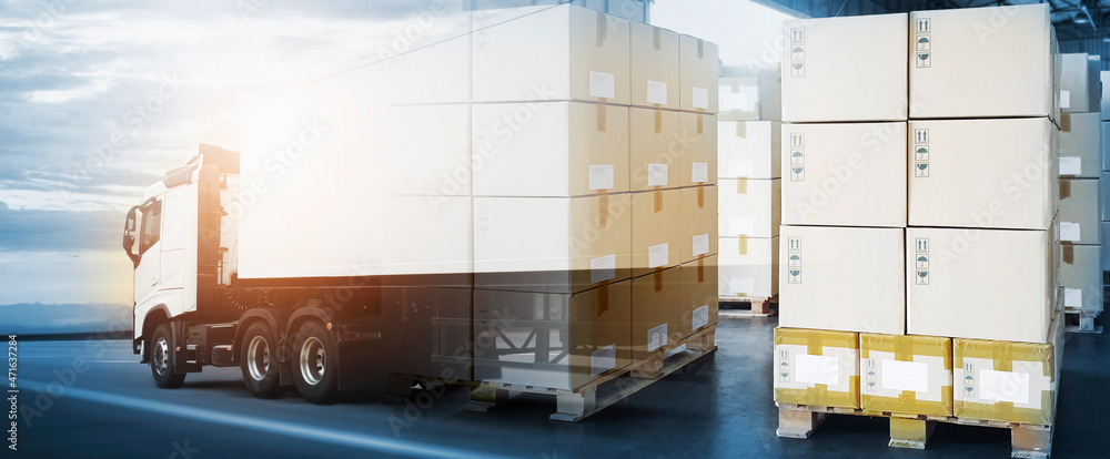 Double Exposure of Package Boxes with Semi Trailer Truck Driving on Highway Road. Commerce Supply Chain. Shipment. Shipping Freight Truck. Logistics Cargo Transport Concept.	