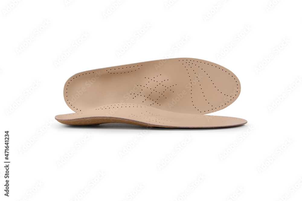 Orthopedic insole on a white background. Treatment and prevention of flat feet and foot diseases. Foot care, comfort for the feet. Wear comfortable shoes. Medical insoles. Flat Feet Correction Orthopedic insole on a white background. Treatment and prevention of flat feet and foot diseases. Foot care, comfort for the feet. Wear comfortable shoes. Medical insoles. Flat Feet Correction