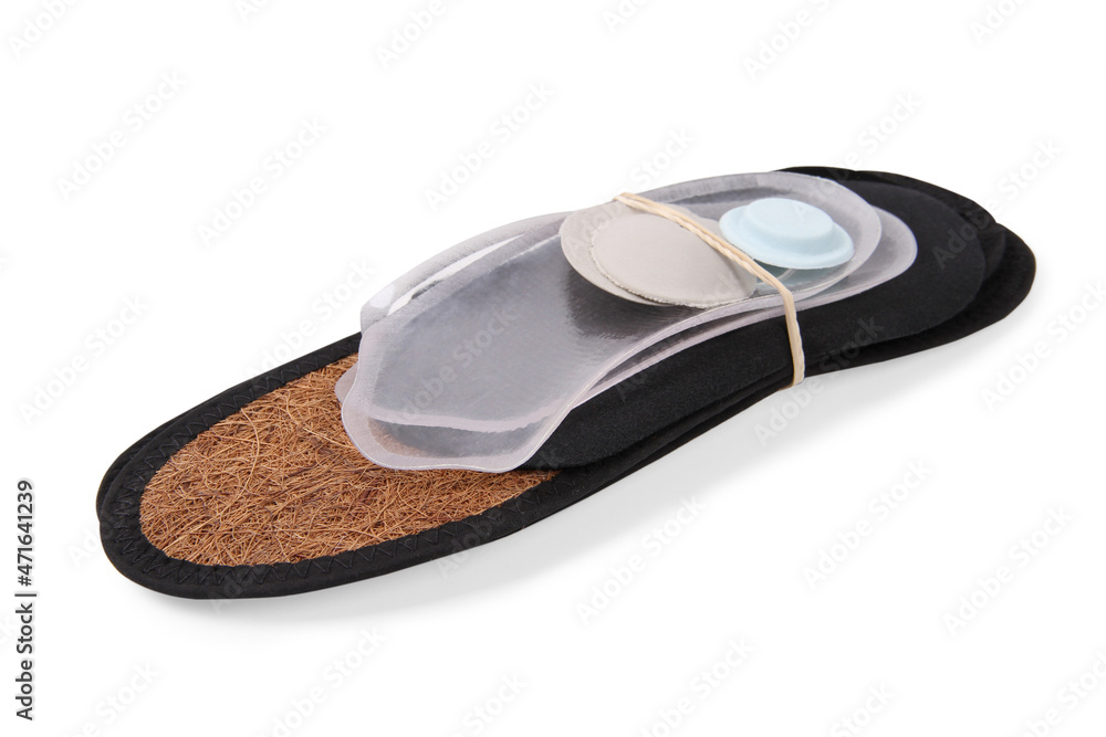 Orthopedic insole on a white background. Treatment and prevention of flat feet and foot diseases. Foot care, comfort for the feet. Wear comfortable shoes. Medical insoles. Flat Feet Correction Orthopedic insole on a white background. Treatment and prevention of flat feet and foot diseases. Foot care, comfort for the feet. Wear comfortable shoes. Medical insoles. Flat Feet Correction