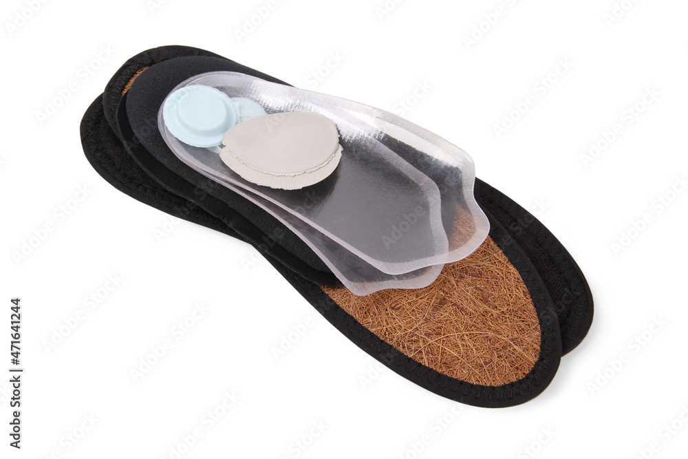 Orthopedic insole on a white background. Treatment and prevention of flat feet and foot diseases. Foot care, comfort for the feet. Wear comfortable shoes. Medical insoles. Flat Feet Correction Orthopedic insole on a white background. Treatment and prevention of flat feet and foot diseases. Foot care, comfort for the feet. Wear comfortable shoes. Medical insoles. Flat Feet Correction