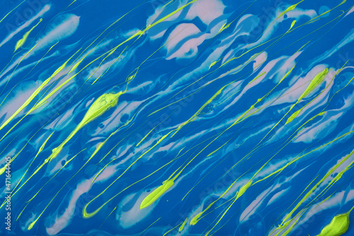 Abstract fluid art background blue and green colors. Liquid marble. Acrylic painting with turquoise gradient and splash.