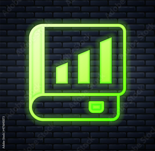 Glowing neon Financial book icon isolated on brick wall background. Vector