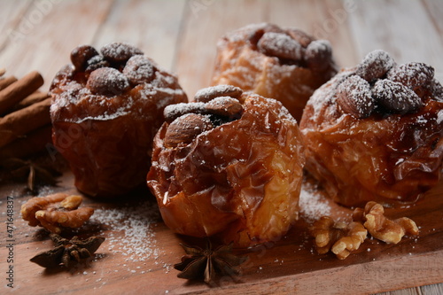 Wallpaper Mural Baked apples with nuts and raisins. Homemade baked apples in the oven, with sugar powder close-up. Holiday dessert Torontodigital.ca