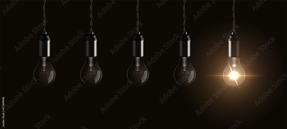 Light bulbs hang from ceiling with one bright lightbulb glowing, symbol of innovation Light bulbs hang from ceiling with one bright lightbulb glowing, symbol of innovation