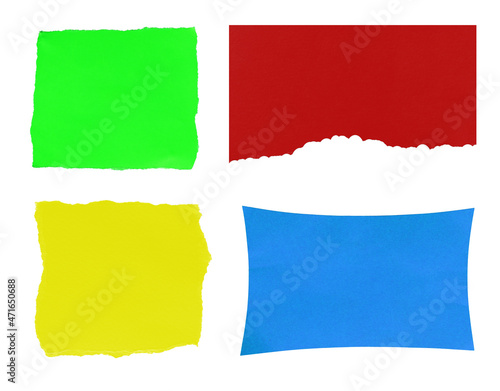 various colors of torn paper isolated on white background.