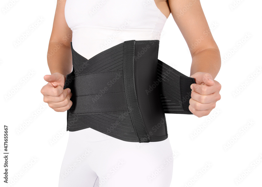 Orthopedic lumbar corset on the human body. Back brace, waist support belt  for back. Posture Corrector For Back Clavicle Spine. Post-operative Hernia  Pregnant and Postnatal Lumbar brace after surgery. Stock Photo