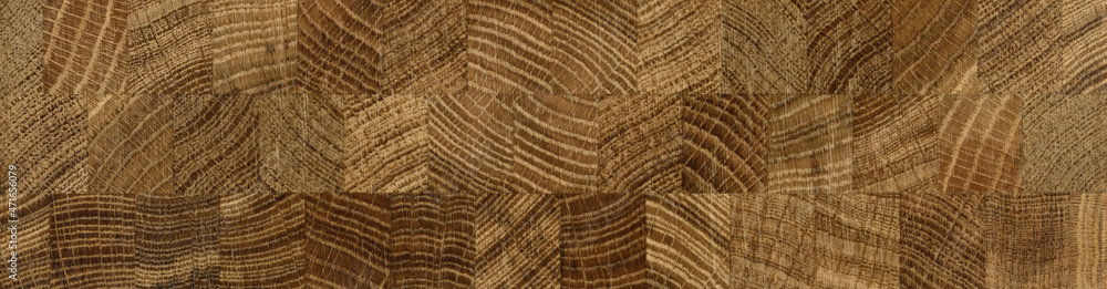 Fototapeta premium Wooden board assembled from different types of wood. High detail.