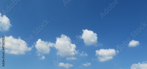 Blue sky with beautiful round clouds