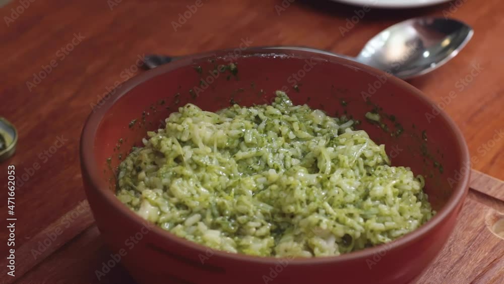 Preparing food. Preparing delicious risotto. Pesto sauce. Preparing food. Preparing delicious risotto. Pesto sauce.
