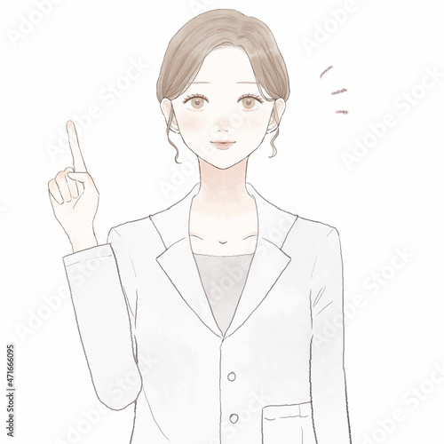 指をさしながら説明している女性医師