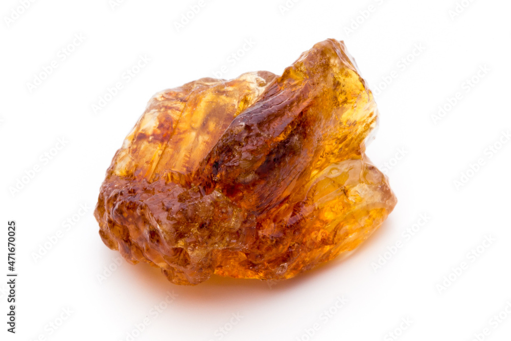 Brown caramelized sugar on white background. Brown caramelized sugar on white background.