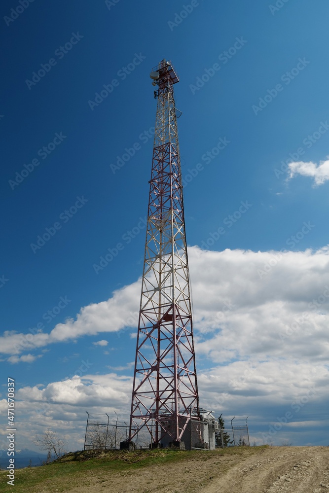 Big metal tower on blue background