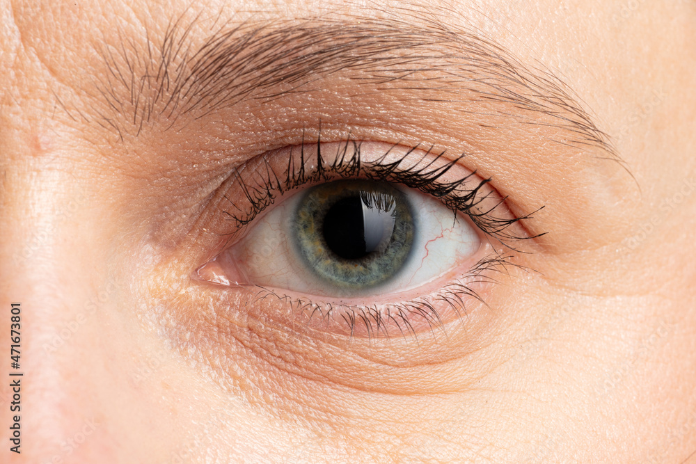 Obraz premium woman's blue eye close up