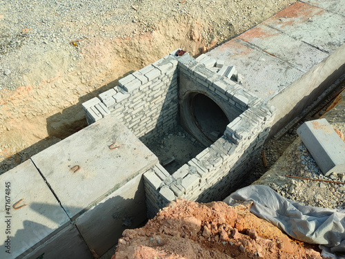 SELANGOR, MALAYSIA -JANUARY 22, 2021: Underground precast concrete box culvert drain under construction at the construction site. It is used to channel stormwater to prevent flash floods.  photo