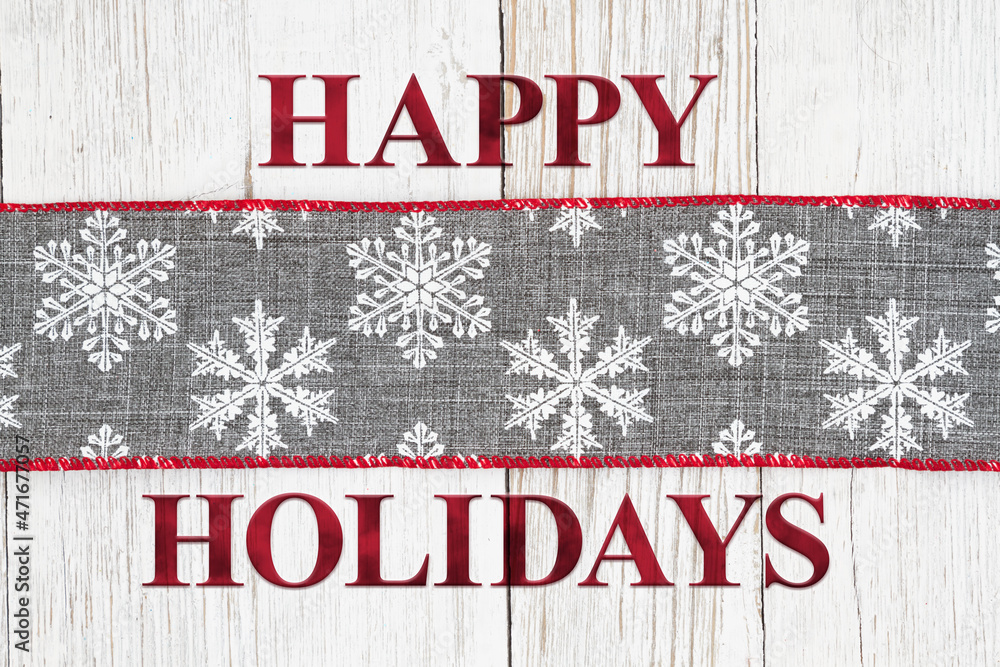 Happy Holidays message sign with gray and white snowflakes Happy Holidays message sign with gray and white snowflakes