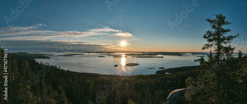 Scenic view of sunrise on Koli Fell and Lake Pielinen, Koli National Park photo