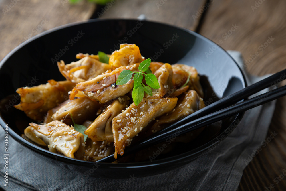 Gyoza with duck and sesame seeds Gyoza with duck and sesame seeds