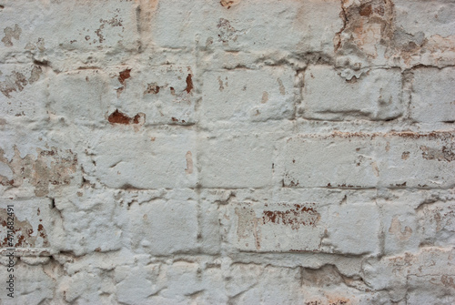 View of white brick weathered wall. Copyspace. Closeup