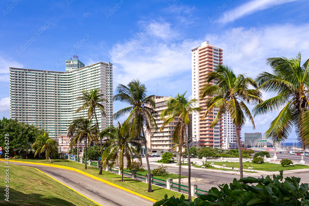 View of high-rise buildings and palm trees of Havana.Cuba
