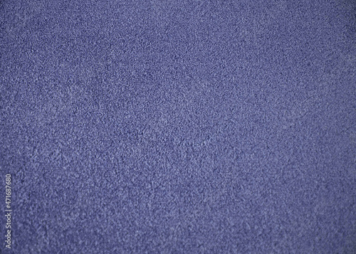 Blue indoor office carpet texture. High resolution seamless monochrome wool fabric background. Interior material background top view. Short pile carpet. Blank generic microfiber textile texture.