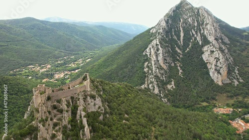 Wallpaper Mural Aerial shot showing the Medieval Puilaurens castle and the Canigou mount in the Pyrénées mountain, France Torontodigital.ca