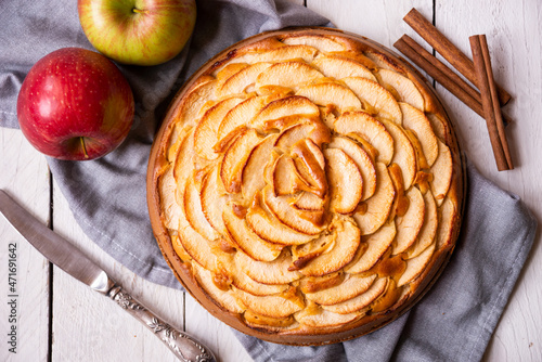 Apple pie, sweet homemade dessert with fresh apples and cinnamon photo