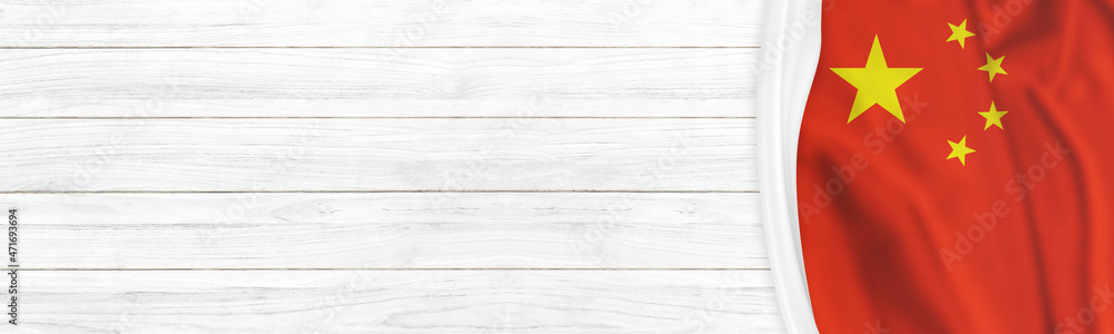 China flag on white, weathered clapboard background with copy space China flag on white, weathered clapboard background with copy space