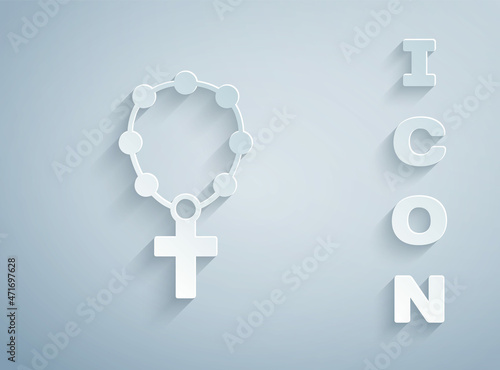 Paper cut Rosary beads religion icon isolated on grey background. Paper art style. Vector
