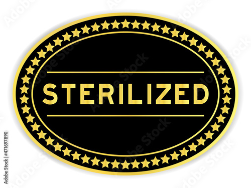 Gold and black color oval label sticker with word sterilized on white background