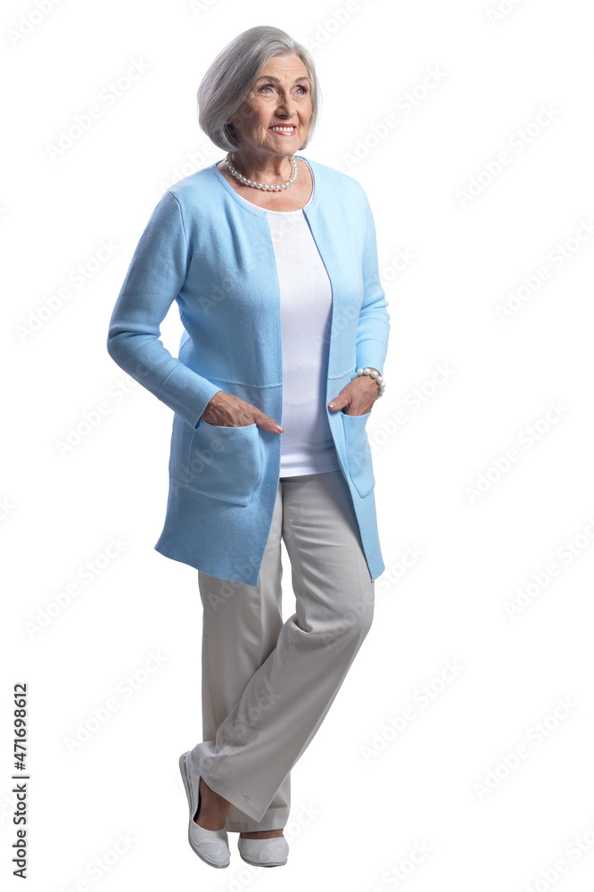 Smiling beautiful senior woman posing on white background