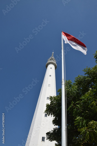 The beacon tower in Sembilang, Penajuh, Bangkalan, Madura, Indonesia is a Dutch lighthouse built in 1879.  photo
